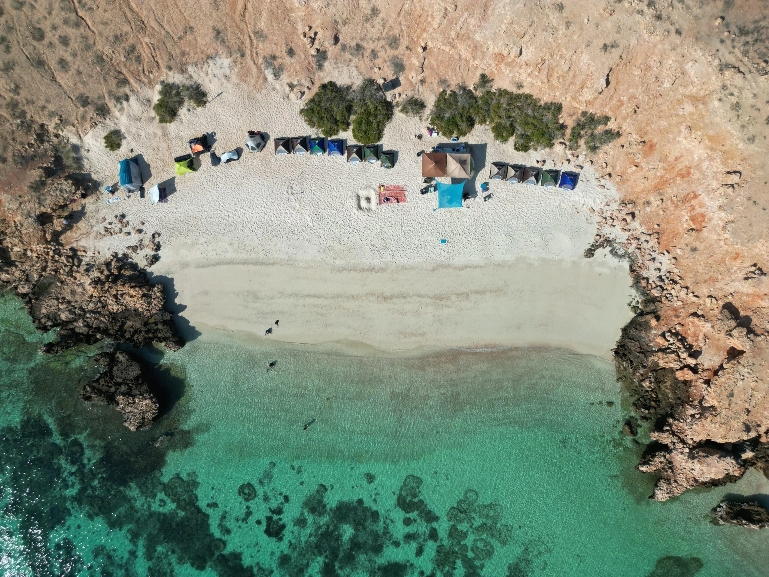 Aerial view of the island camp and turquoise bay, Daymaniyat Islands