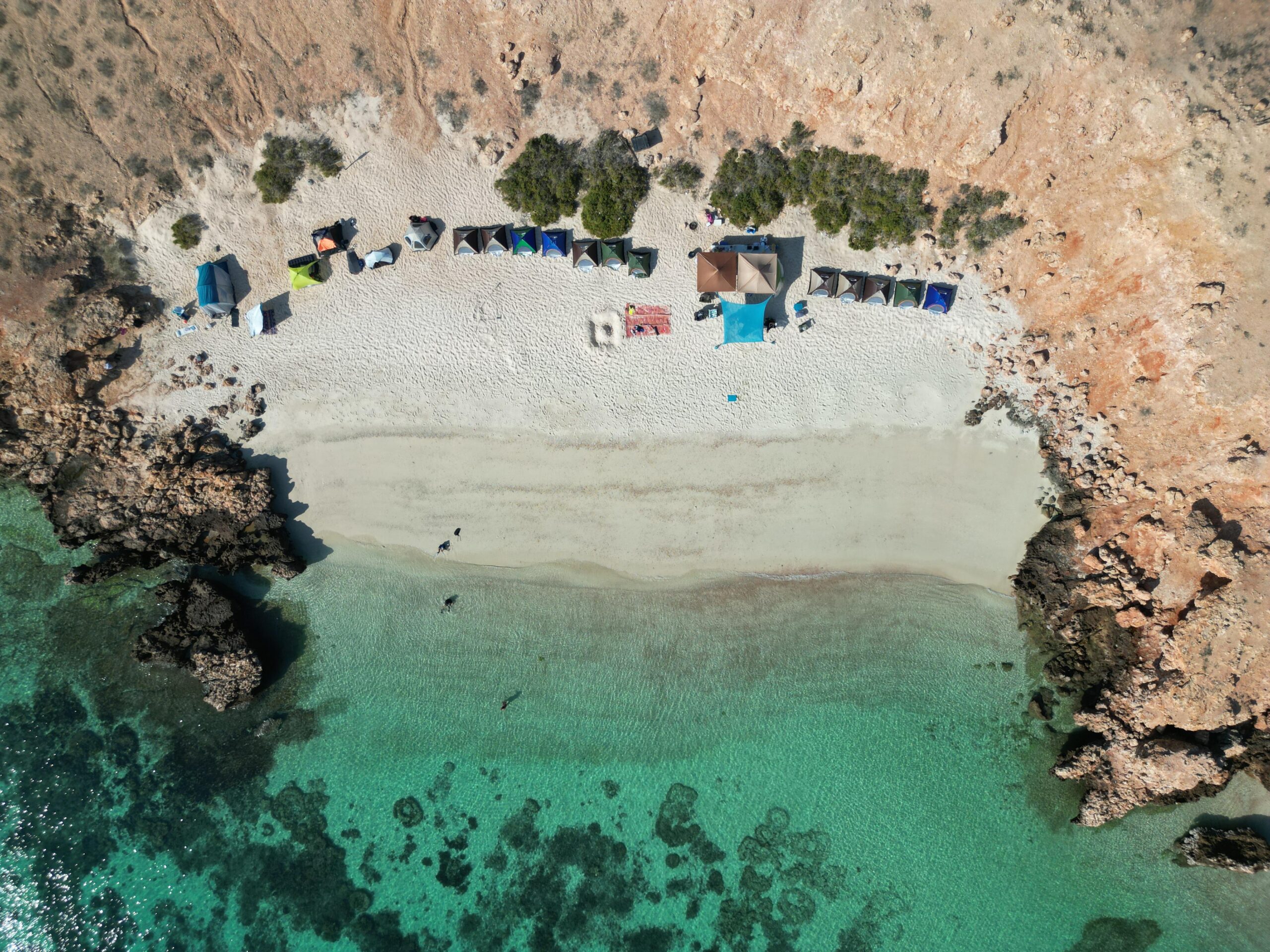 Aerial view of the island camp and turquoise bay, Daymaniyat Islands